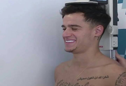 وشم كوتينيو بالعربية يثير فضول الجماهير