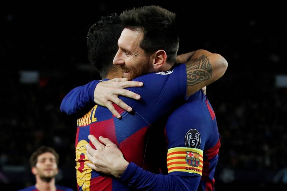 ميسي يقود برشلونة للصعود لدور الـ16 بدوري الأبطال بثلاثية في دورتموند